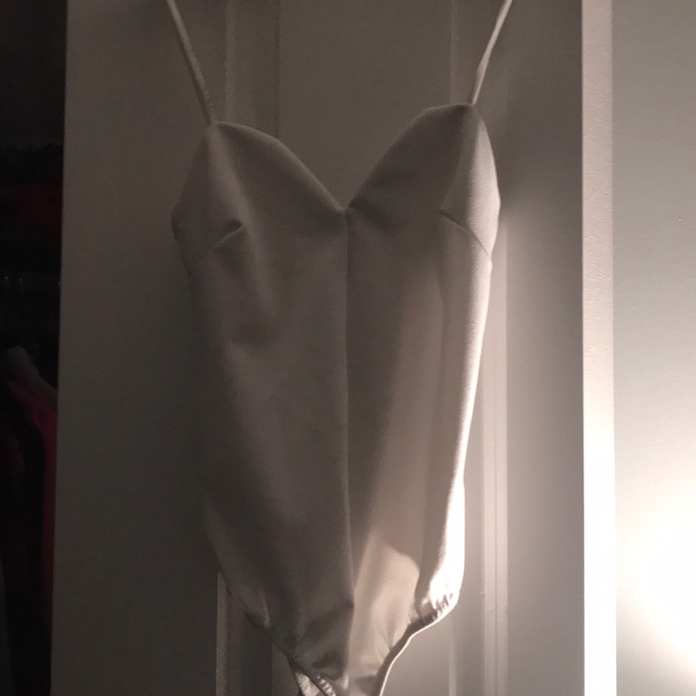 White body suit.